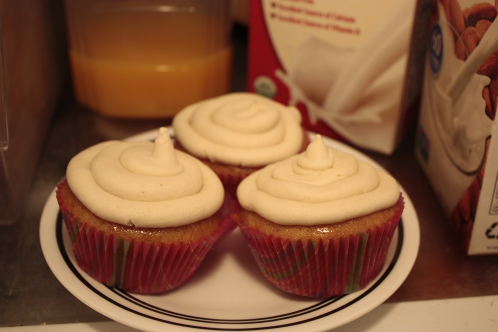 Three cupcakes on a plate